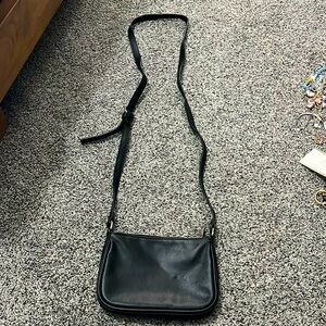 small black one pocket purse
